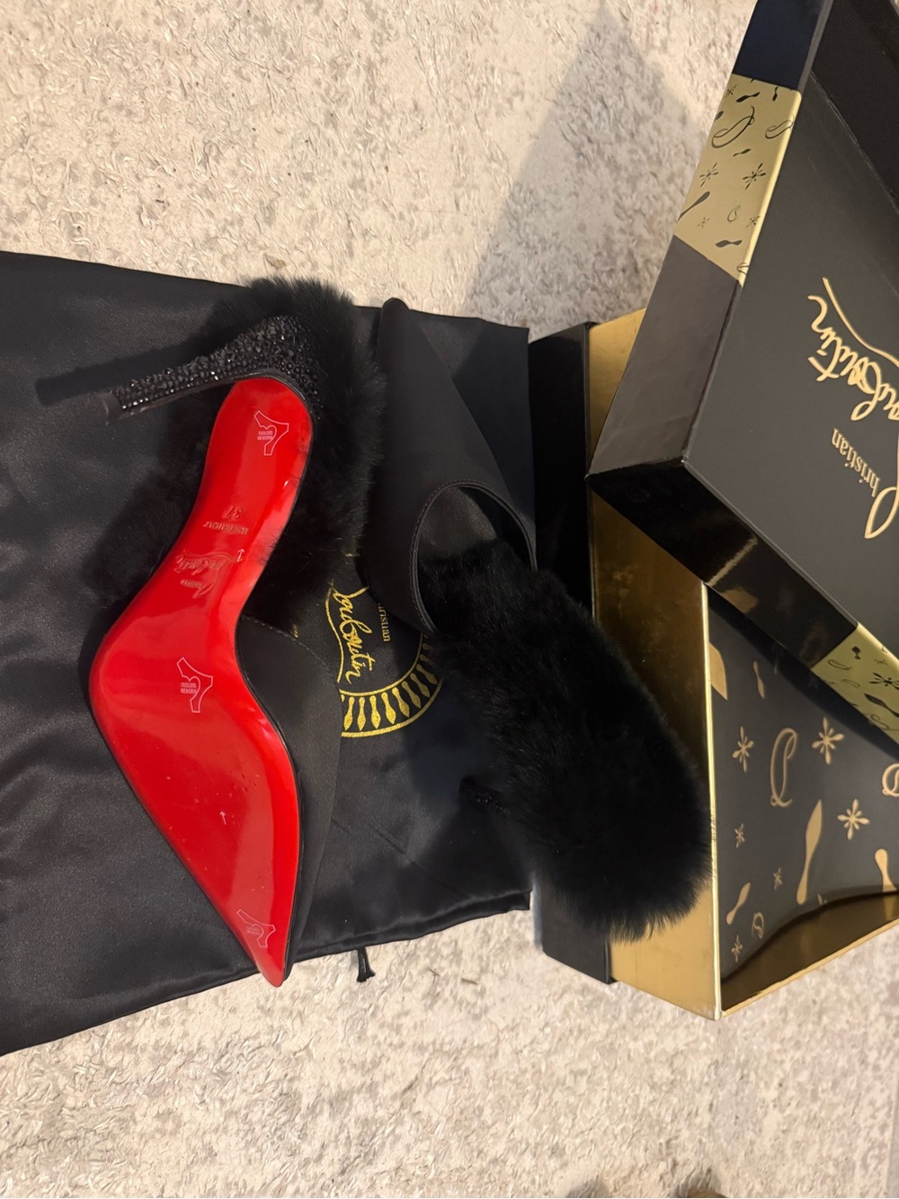 red bottomed heels with fur and gems